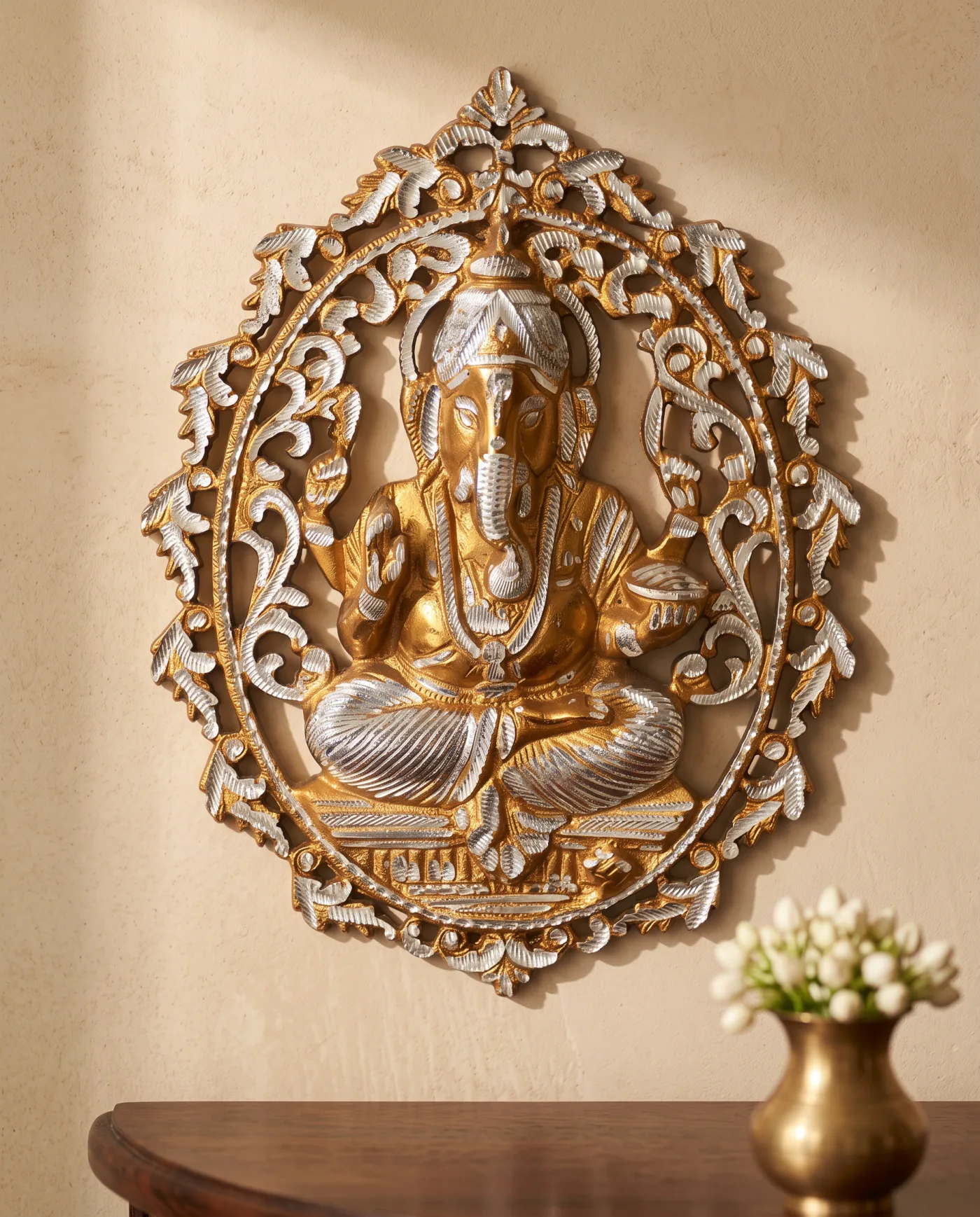 Seated Ganesha in Oval Vine Frame - Gold and Silver
